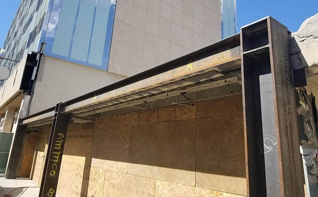Construction site with exposed metal structure.