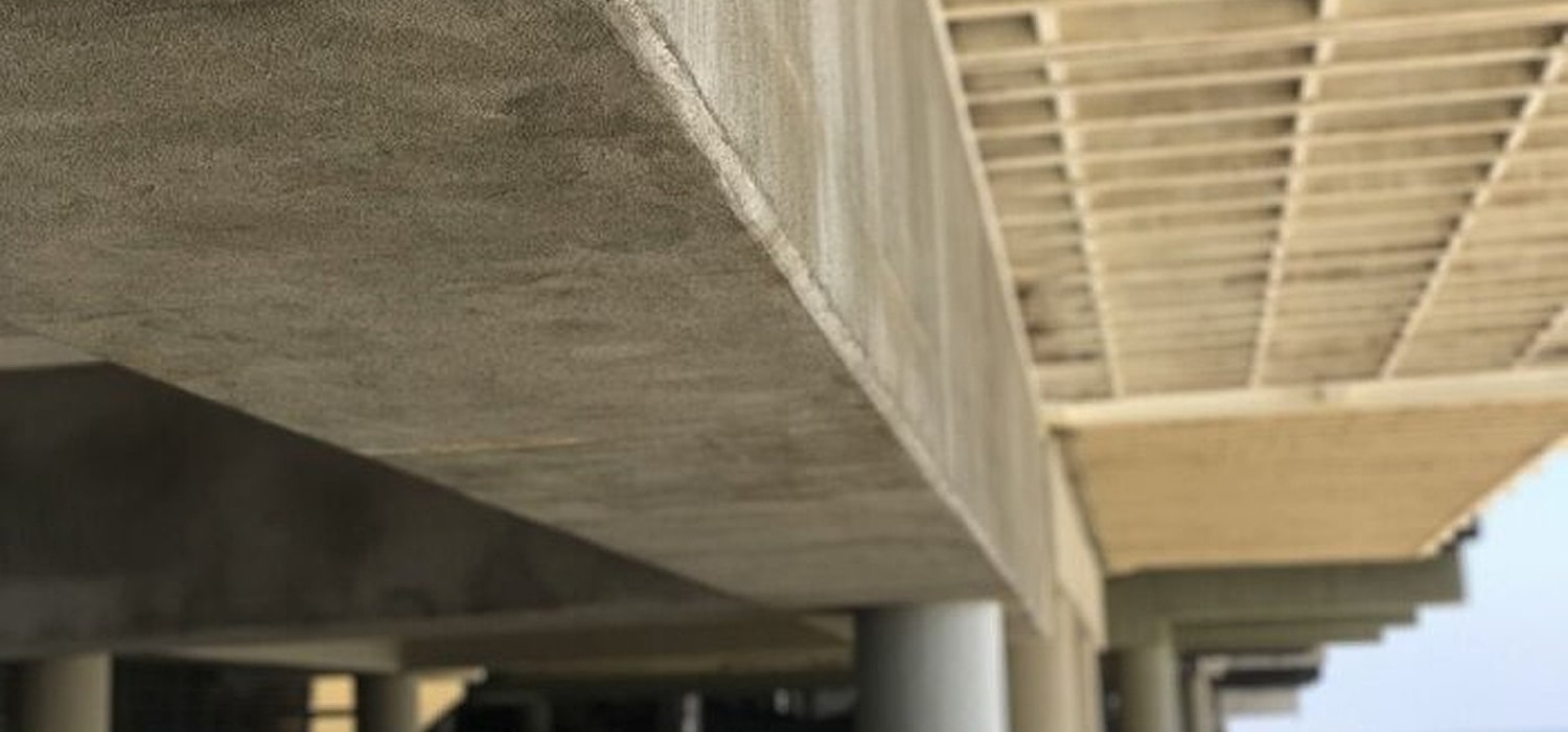 Concrete architectural structure from below perspective.