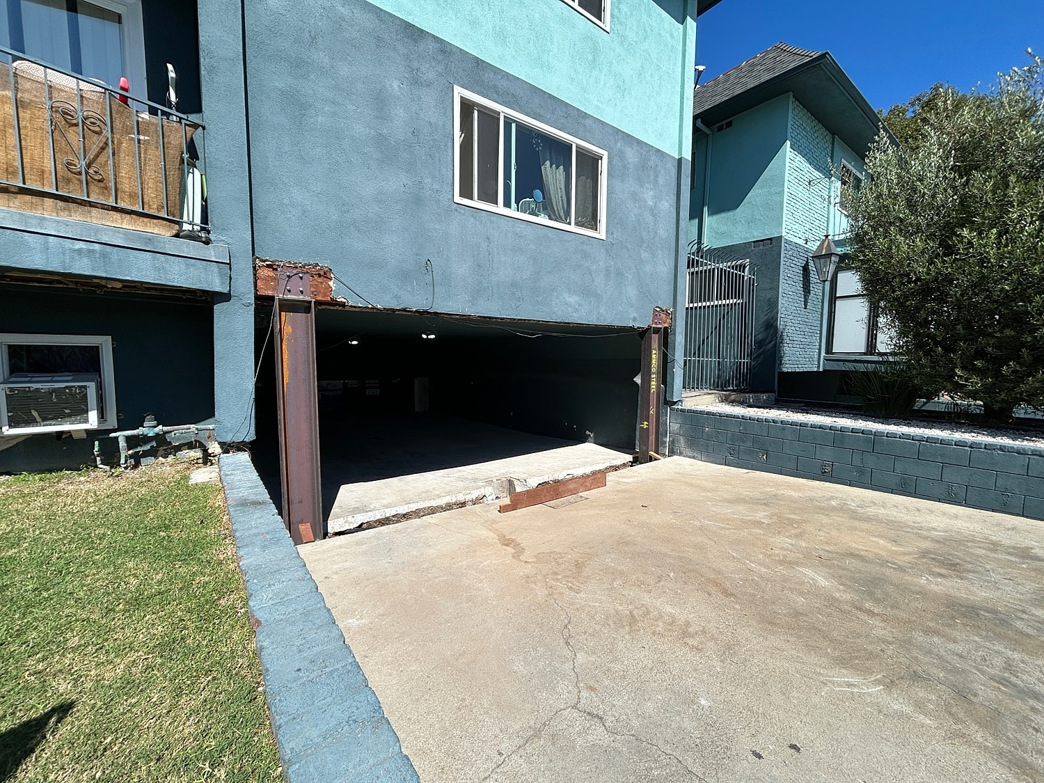 House exterior with garage and parking area.