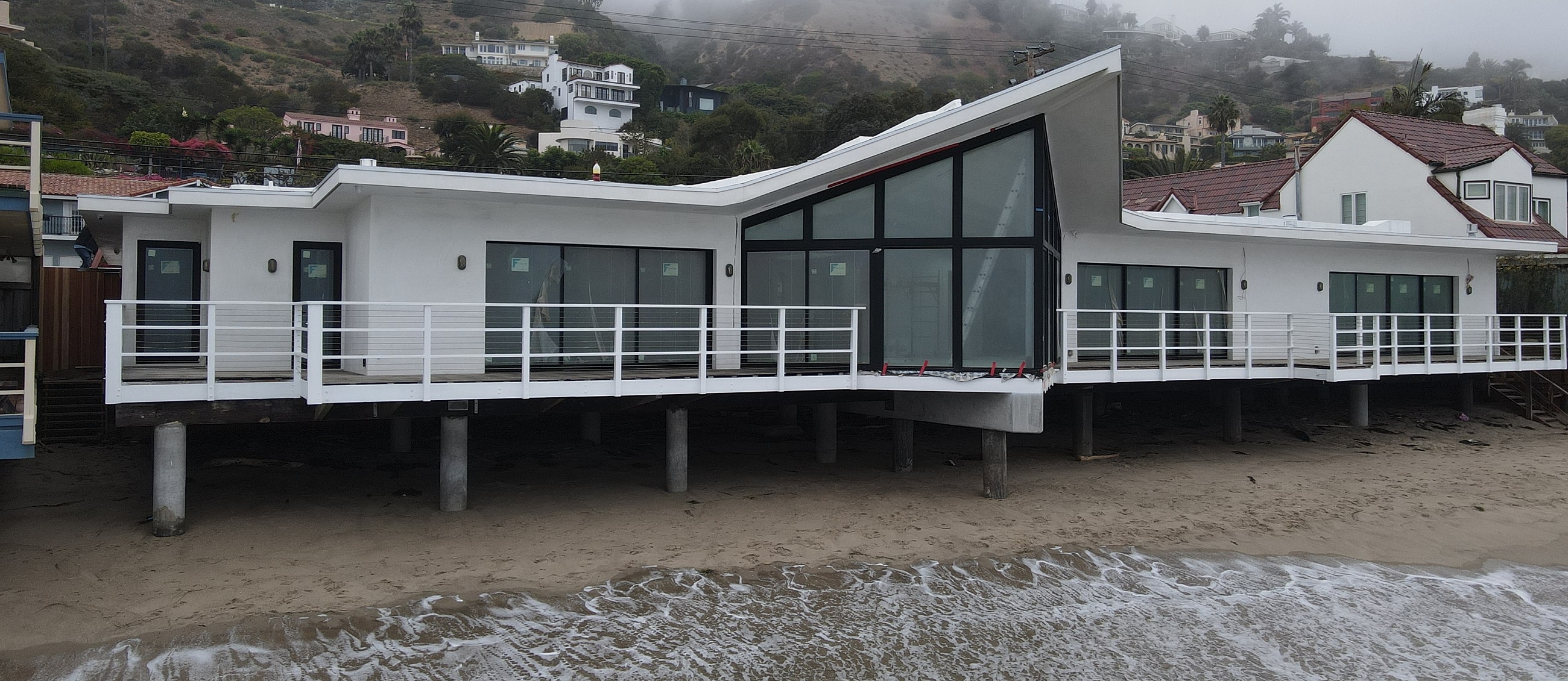 Modern beachfront house with unique architecture.