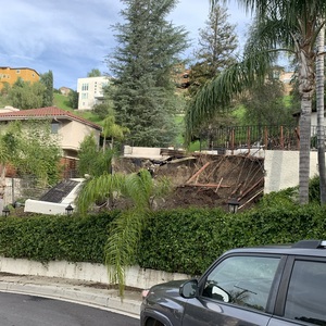 Pipe and Board Hillside Repair